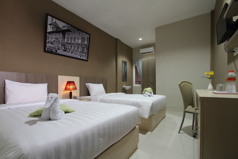 Oyo Flagship 3726 Tembok Batu Residence Tugu Ngoại thất bức ảnh